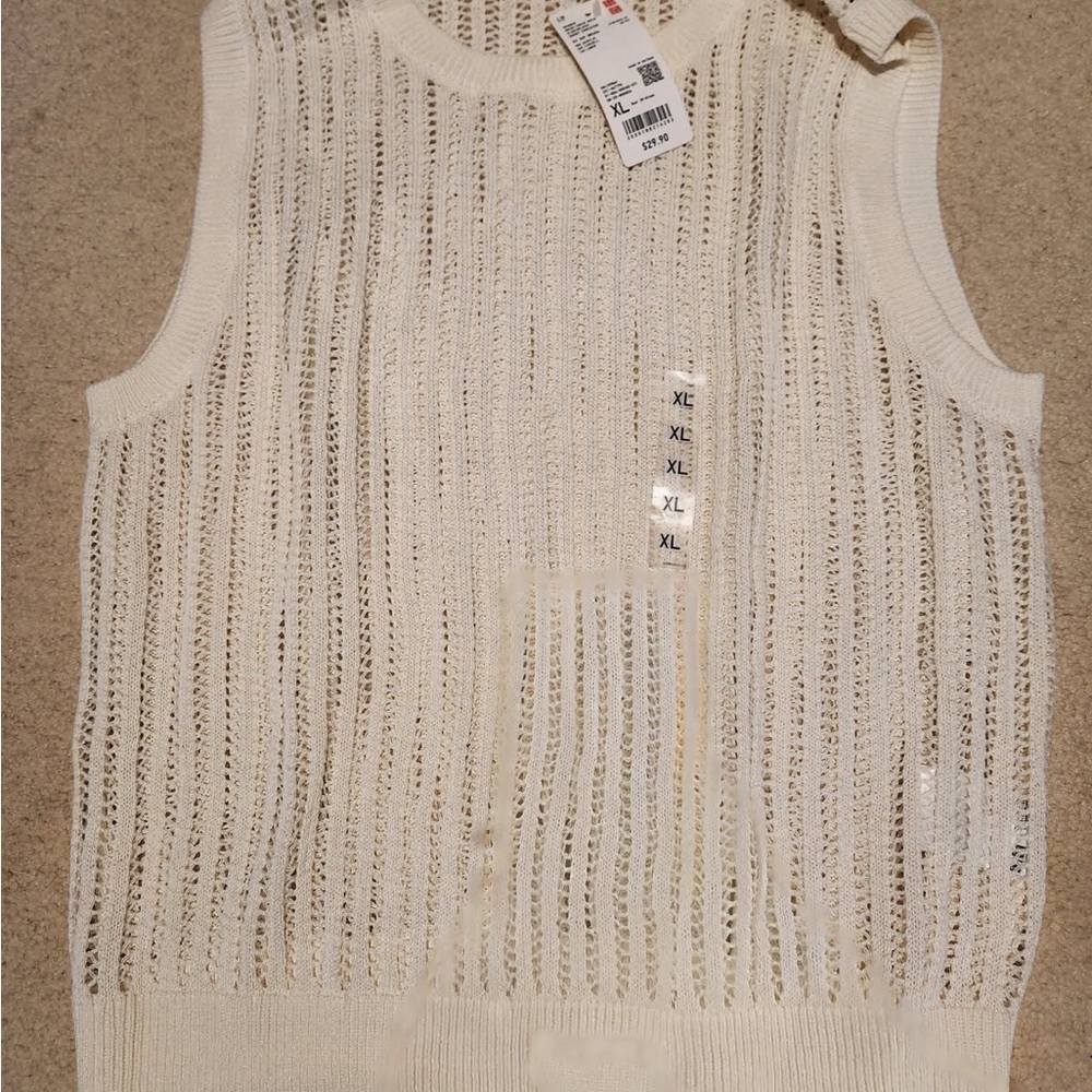 Elegant Cream Sleeveless Sweater